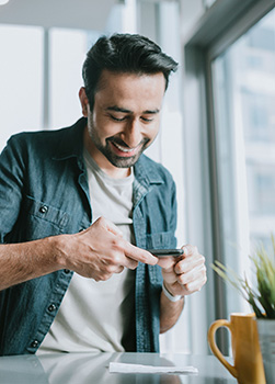 Man scanning check with phone